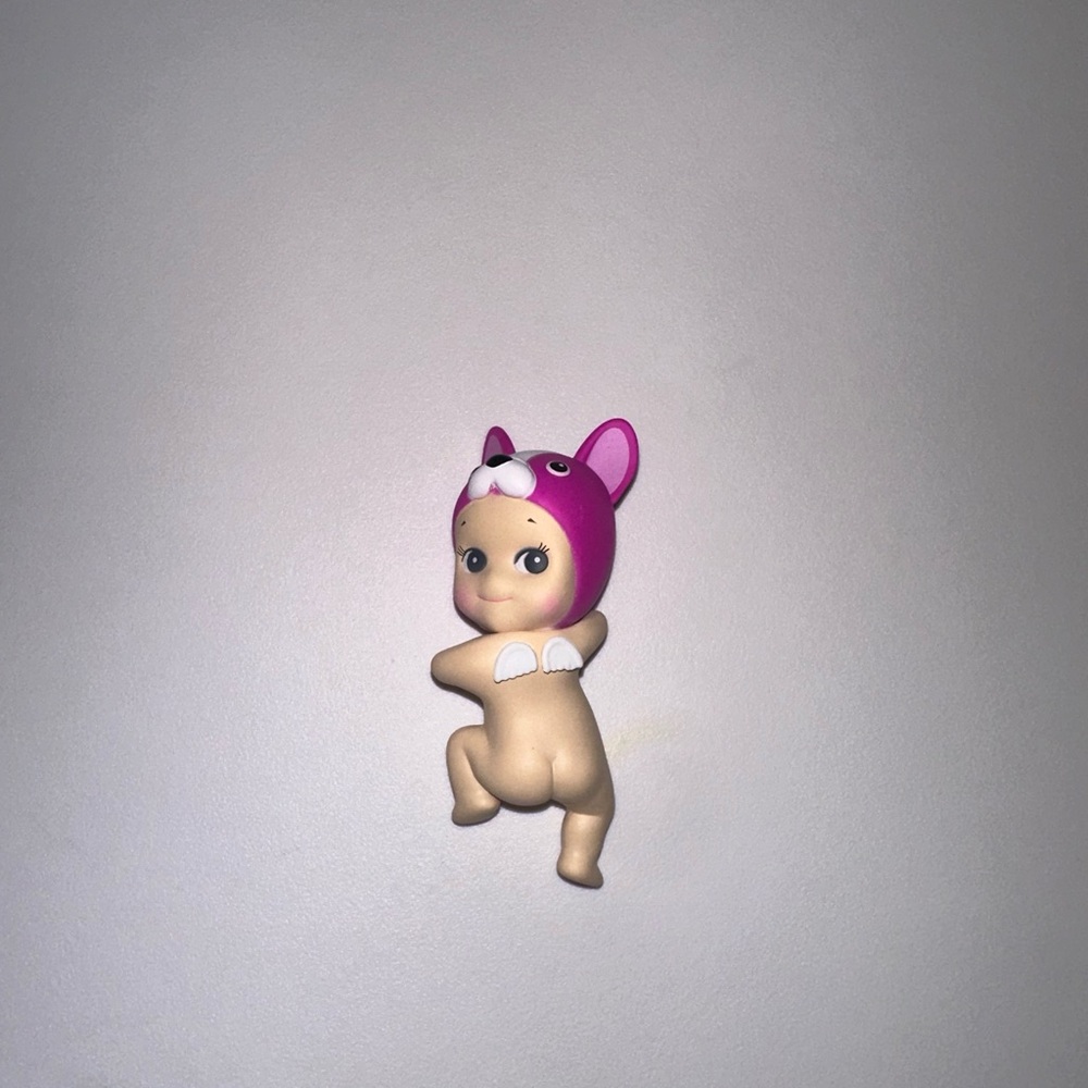 Sonny Angel looking back hipper French bulldog